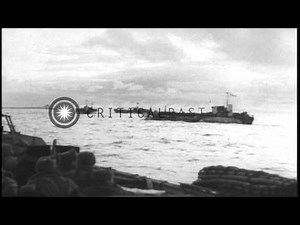 British Marines aboard landing crafts arrive at Walcheren Island in Holland. HD Stock Footage