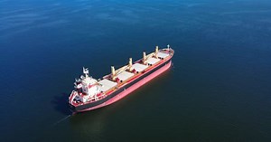 Large Bulk Carrier with Dry Bulk Ship Cruising at Mediterranean Sea