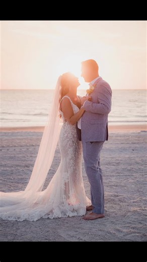 Real Crown Bride of the Week 👑 Effortlessly romantic and beach-perfect ✨ This stunning gown features an allover lace silhouette with a plunging V neckline and delicate lace straps that frame the shoulders beautifully. The fitted shape hugs in all the right places, while the sheer lace detailing adds a soft, ethereal feel. Finished with a graceful lace train and paired with a flowing veil, this look was made for golden sunsets and unforgettable “I do” moments by the water 🌊🤍 A true Real Crown 