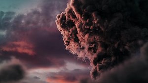 Red volcanic ash. Volcanic eruption. Close up of volcanic eruption