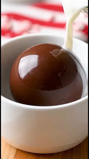 Peppermint Hot Chocolate Bombs Ingredients: 8 oz chocolate 1 cup hot cocoa mix Mini marshmallows Crushed peppermint Method: Melt chocolate; coat inside silicone molds. Chill 5–10 minutes; remove and fill with cocoa mix and marshmallows. Seal with melted chocolate; chill. Drop into hot milk to serve. #PeppermintHotChocolate #HotChocolateBombs #HolidayTreats #WinterWarmers #DIYChocolateBombs | Wow Cookings