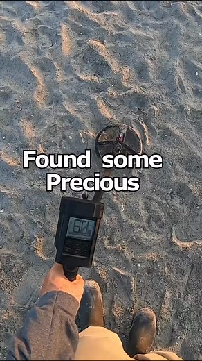 Out on the beach while I was metal detecting and found some precious in the sand digging for lost treasure #meta | detectormoe