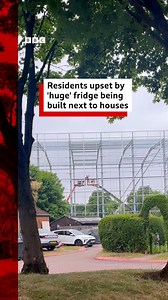 A 20-metre (65-ft) structure is being built by Wing Yip Supermarket and locals say it will "block their views and sun". | BBC Birmingham