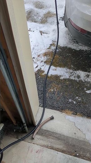 Charging Outdoors - EV Charging Cable and Garage Door