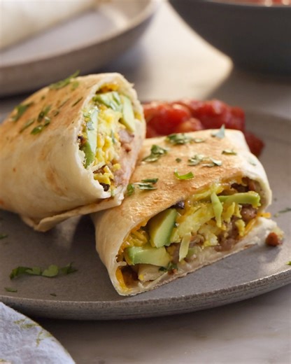 18K views · 313 reactions | If you need a filling, delicious breakfast idea for busy mornings, try these easy breakfast burritos! Loaded with sausage, eggs, hash browns, and cheese, this is the best way to start your day off. | Preppy Kitchen | Facebook