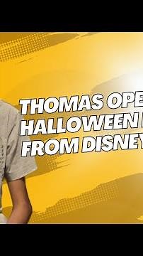 Thomas opening complimentary Halloween themed package he received from Disney