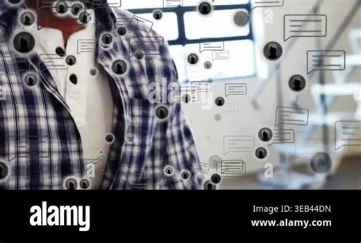 man wearing plaid shirt focusing on technology communication in office with floating chat icons. Collaboration, digital, modern, communication, workspace, visualization, productivity Stock Video Footage - Alamy