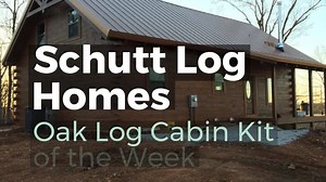 This is a Chalet 2000 sqft from Schutt Log Homes. This Oak log cabin kit has 3 bedrooms and 2 full baths, one and a half stories covered porches and room to move. oakcabins.com | Schutt Log Homes