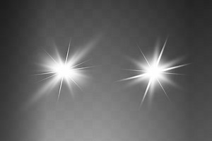 White glowing light explodes on a transparent background. Sparkling...