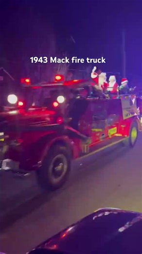 Brent wood mo FD parade with an old 1943 Mack fire truck￼