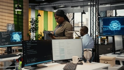 clip-3957262171-software-developers-working-ai-startup-training-predictive