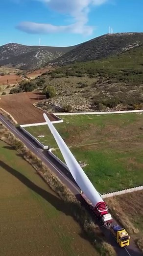 Transporting 80 meter long wind turbine blades from @vestas — The trailers that haul these blades are incredible! Many of them use hydraulic systems to adjust the blade angles or tilt during transportation, allowing for better maneuverability and overcoming obstacles. — Each time they transport a blade like this it often requires special permits from transportation authorities. The route planning involves avoiding low bridges, tight turns, and other obstacles! #windfarm #windturbine #trucking #t