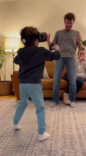 Kid Punches Dad While Using VR Headset
