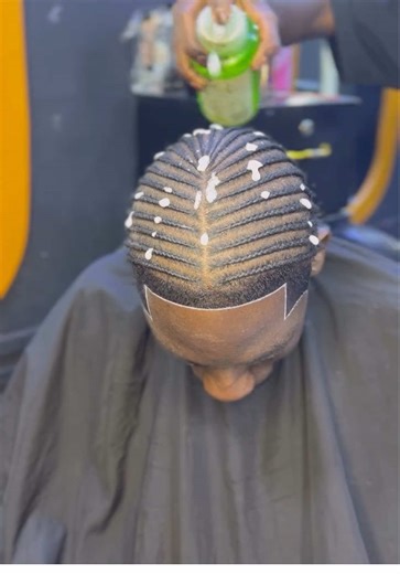 Master the Art of Clean Cuts at Our Tanzanian Barbershop