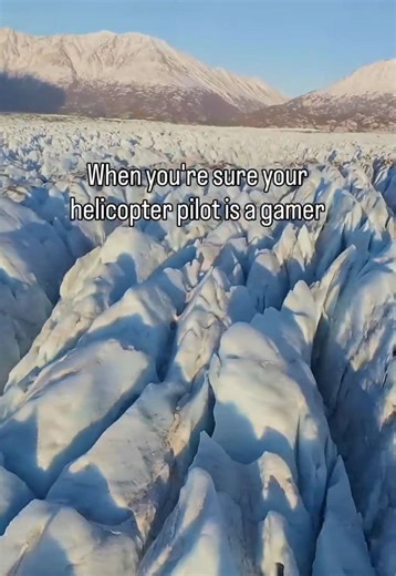I thought this was a tour ... not a video game 🎮🚁 Flying low over gorges and icy crevasses of Knik Glacier felt like GTA: Alaska Edition. Absolutely stunning landscapes to see in winter in Alaska. Shoutout to @Outbound Heli for the most unreal “real-life video game” experience 🤣 - the most thrilling helicopter ride I've ever been on! #adventure #glacier #wintertravel #helicoptertour