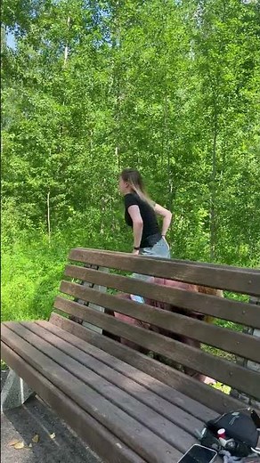 Two Sisters Topple Backward Off Park Bench