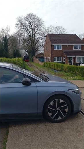 Leighton Buzzard steam railway, narrow gauge loco "Doll" passes not long after leaving Pages Park