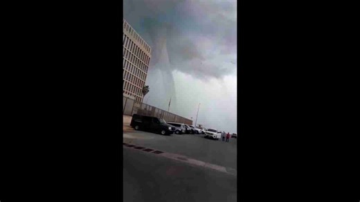 Massive waterspout swirls over Havana