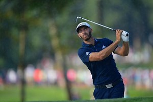 Errant ball nearly hits Dustin Johnson mid-swing, DJ still sticks shot and makes birdie
