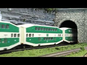 Go-Train HO Scale with 9 Cars and 2 Engines