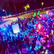 Late-night EDM protest with lasers and glowsticks - Video