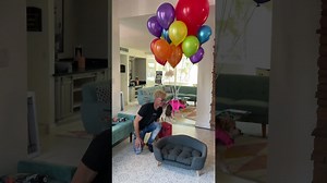 Dog floats away with helium balloons!