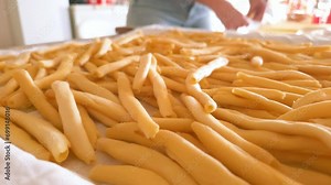 Wife woman while prepare homemade fusilli pasta in kitchen, tasty healthy handmade italian food