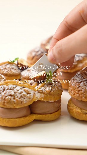 Prepare your tastebud to be delighted by our Paris Brest with Caramel and Chocolate Cream this January! Wonder how fun it could be? ✨😍 Book your slot through our website or get a member's referral! #abccookingstudio #cookingstudio #parisbrest #dessert #dessertikt #placetogo #placetogojkt #placetovisit #cookingactivity #activityideas #chocolate #caramel #Hazelnut