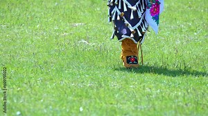 Pow Wow, 2nd Annual Two Spirit Powwow, by 2-Spirited People of the 1st Nations. Women traditional dance in Jingle Dress a shoes healing or medicine dress.