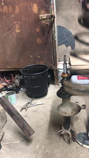 Adjusting Front Coil Springs in a Workshop