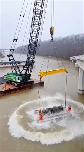 Workers freeze as the bridge pier suddenly drops into the water!