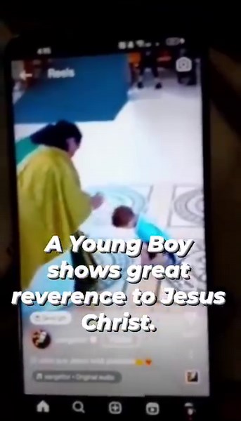 A Young Boy shows great reverence to Jesus Christ. | Catholic Tradition & Evangelization