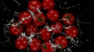 Exploding Cherry Tomatoes Water On Black Stock Footage Video (100% Royalty-free) 1041679849 | Shutterstock