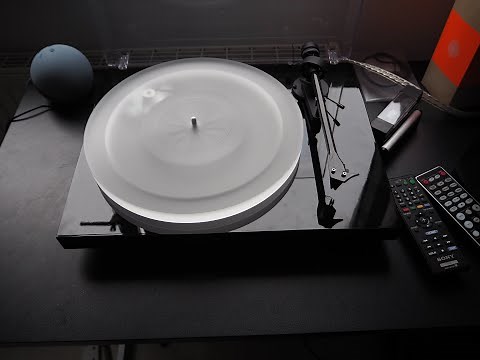 Pro-Ject Debut Carbon DC Turntable with Acryl It Platter, 2M Black Stylus on 2M Red Cart Review