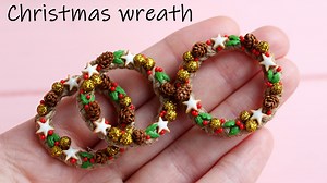 115K views · 1.1K reactions | Detailed video at the link: https://youtu.be/z3Uj8nIHcrI To make the base of the wreath, I use twine and transparent glue Moment. I draw a star model on paper and cut it out on polymer clay. Shape and bake on glass. I’m toning with dry pastel. I glaze it. How to make frosting: https://youtu.be/tKRPP6UnCoI I cover the wreath balls with liquid gel Fimo and sprinkle with glitter. I glue the decor with Super-glue Moment gel. | Sweetminidollhouse | Facebook