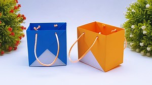 How to fold paper craft bag step by step - Handmade paper arts - DIY school project ideas #Crafts, #PaperBag #OrigamiStorage | Mr. Creator