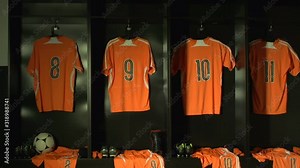Soccer / Football Changing room / Locker room. All the kit or uniform is laid out ready for the players.