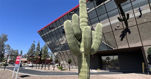 Reflecting on history of Tucson's glass and steel upside-down pyramid