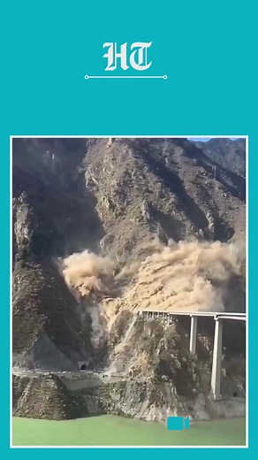 #WATCH | A section of the recently inaugurated Hongqi Bridge in southwest China’s Sichuan province collapsed and crumbled into a river following a massive landslide. Dramatic videos of the incident have gone viral on social media, showing the bridge’s concrete structure falling apart as the mountainside beneath it gives way. More details 🔗 https://www.hindustantimes.com/trending/newly-constructed-hongqi-bridge-in-china-partially-collapses-dramatic-video-goes-viral-101762880858015.html?utm_sourc
