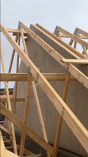Internal bracing and strapping into spandrel panel build up timbers truss clips chevron bracing