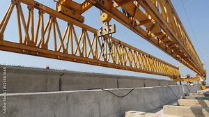 This is the steel structure of a launcher gantry that will be used for erection precast concrete I Girder across the river .