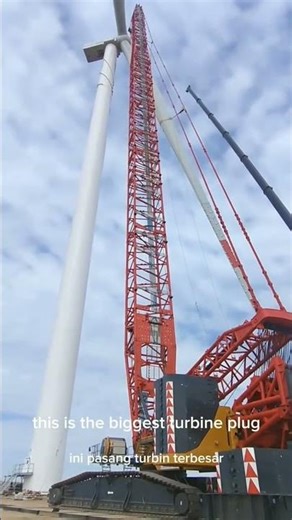 The process of turbine installation using a crane"
