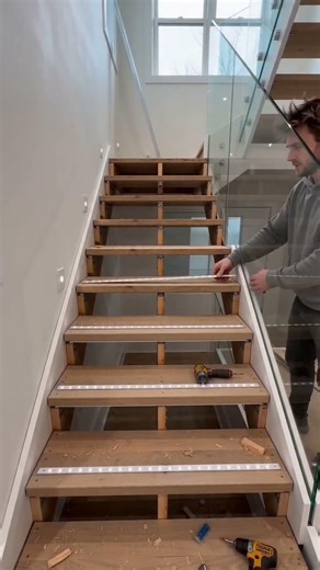 I rebuilt my stairs into a clean, modern design with soft step lighting for a premium look. #usa