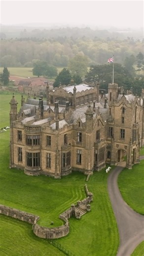 A very misty English morning at Allerton Castle. Allerton Castle is a stunning Gothic revival stately home located in North Yorkshire, England. It was built in the 19th century for Lord Mowbray by the renowned architect George Martin. The castle features impressive architecture, with intricate detailing both inside and out, reminiscent of medieval castles. Throughout its history, Allerton Castle has been used for various purposes, including as a private residence, a military convalescent hospita