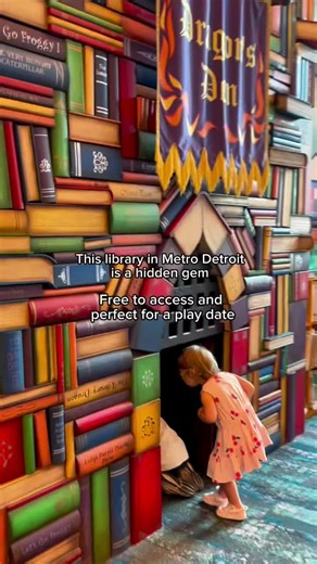 *FREE* Indoor Fun awaits as you step into a FAIRYTALE (including a sleeping dragon) at this hidden gem in Metro Detroit! 🏰 FREE to access and perfect for a play date - the Children’s Department at Southfield Public Library is one of the BEST in Metro Detroit! Enter through a life-sized book door and step into a magical world filled with wonder…including: 🐉 A sleeping (and snoring) dragon tucked inside a cozy hideaway 👑 A book throne fit for little royalty 🌳 A giant treehouse big enough to re
