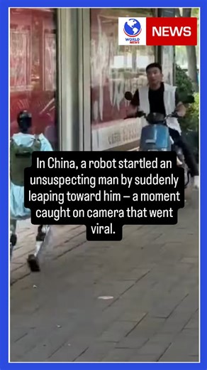 6.2K views · 77 reactions | In China, a robot startled an unsuspecting man by suddenly leaping toward him — a moment caught on camera that went viral. Viewers were amused by the bot’s “playful” behavior, joking that robots might soon develop humor. The clip perfectly captures how unpredictable — and oddly human — our tech interactions are becoming. #worldnews #worldnewsapp #news #newsapp #China #Robots | World News | Facebook