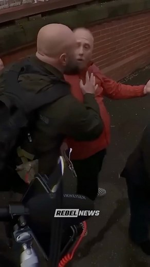 87K views · 1.9K reactions |  Leftist FAKES FALL to get Avi's security ARRESTED Unfortunately for him... it was all CAUGHT ON CAMERA. Full video: rebelne.ws/4nEiZOA | Rebel News Australia | Facebook