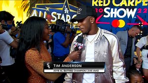 Tim Anderson shows off his outfit