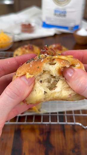 Loaded Baked Potato Dinner Rolls are soft, fluffy rolls infused with mashed potatoes, cheddar cheese, crispy bacon, and chives, capturing all the flavors of a loaded baked potato in every bite. This recipe comes from King Arthur Baking Company I used their bread flour to make these flakey tender rolls. This is a recipe you'll definitely be making on repeat and is a must for the holidays. Comment "RECIPE" & I'll send you the full recipe link. https://www.mnpa6gtrk.com/STDPPT4/2TPMZ5Q3/? uid=33758