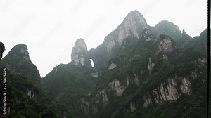The longest cableway in the world, landscape view with the lake, mountains, green forest and mist - Tianmen Mountain, The Heaven's Gate at Zhangjiagie, Hunan Province, China, Asia